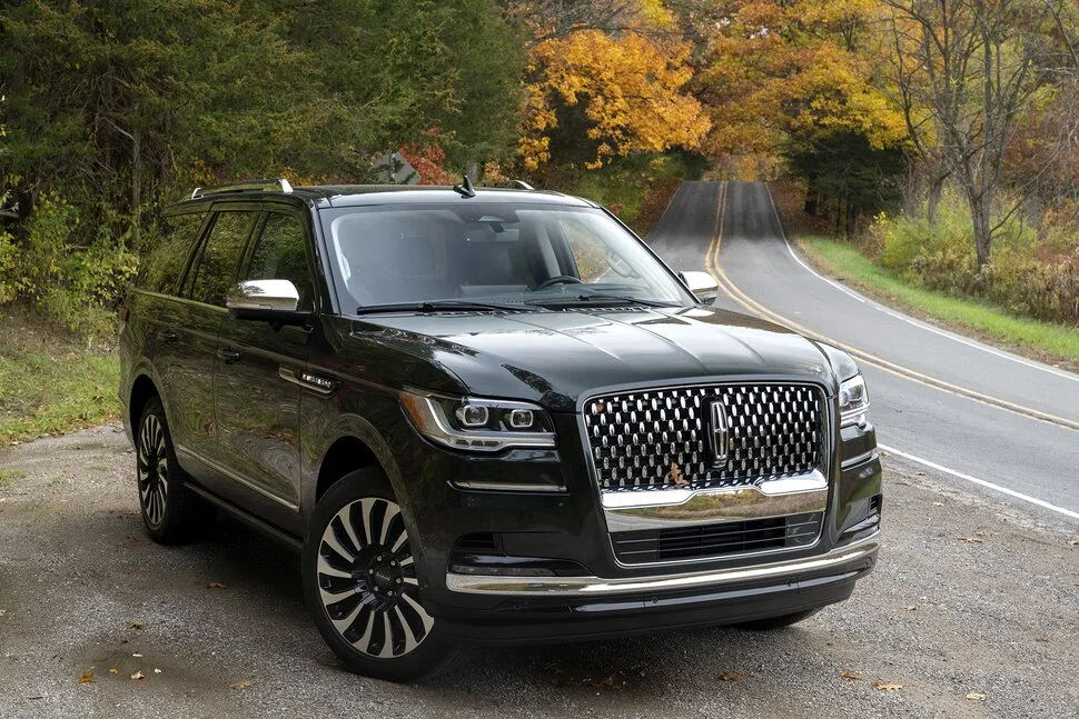 Black luxury executive SUV in the original airport transfer backup
